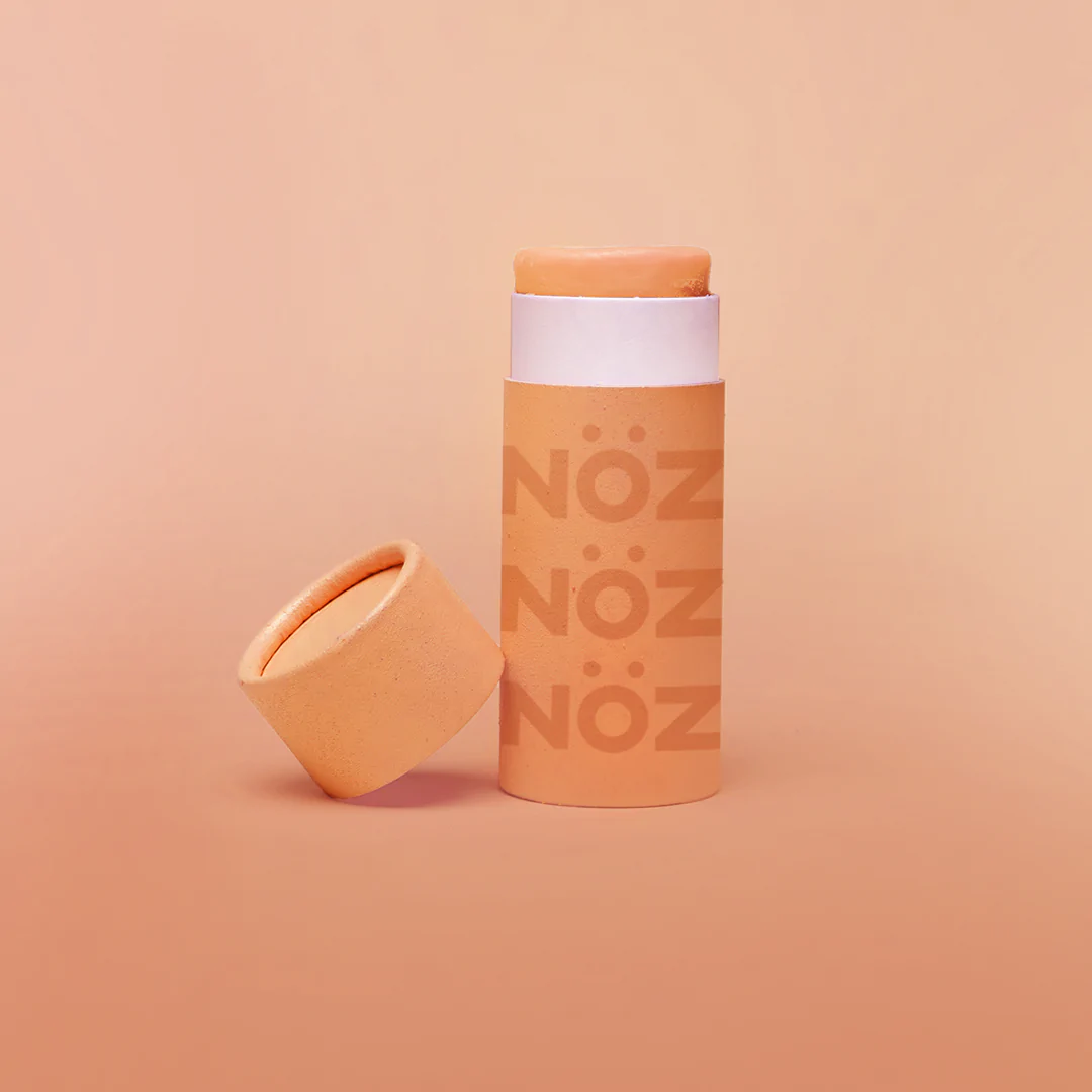 The sight of NOZ non-sticky sunscreen in bright orange. 