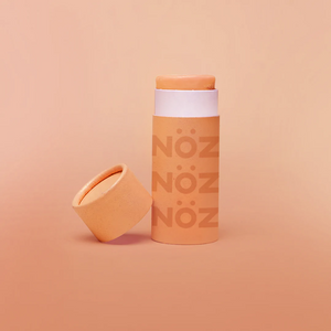 The sight of NOZ non-sticky sunscreen in bright orange. 